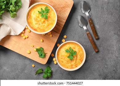 Ramekins With Corn Pudding On Table