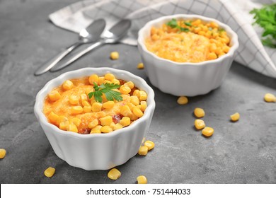 Ramekins With Corn Pudding On Table