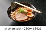 Ramen : Japanese noodle soup with rich broth, featuring toppings like pork, soft-boiled eggs, and vegetables. Ramen