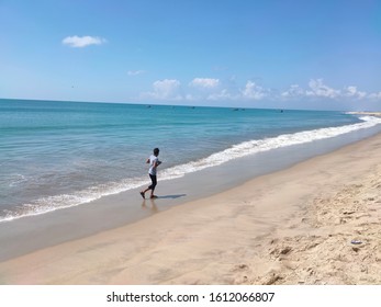 Rameswaram,Tamil Nadu/India-1/6/2020: This photo is of a boy running on a beach.