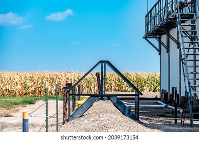 Ramp And Stairs Over A Secondary Containment Dike For Chemical Oil Storage Confined Space