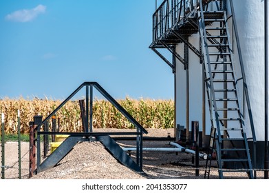 Ramp And Stairs Over A Secondary Containment Dike For Chemical Oil Storage Confined Space