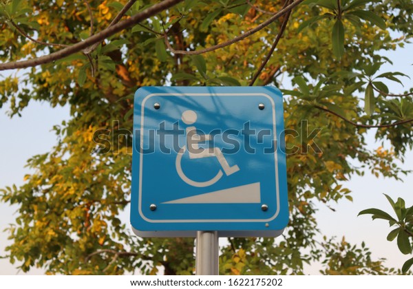 Ramp symbol
for disabled people on blue
background