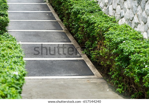 ramp way for\
support wheelchair disabled people.Using wheelchair ramp\
(Barrier-free access).Selective\
focus.
