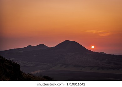 Rana is a significant three-peak mountain 457m. in the western part of Ceske stredohori. The Rana National Nature Reserve is situated on the south-western hill of the trike, is the center of paraglide - Powered by Shutterstock