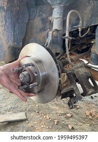 Ranau, Sabah, Malaysia April 21, 2021 Front Brakes And Rotors Of Proton Saga.