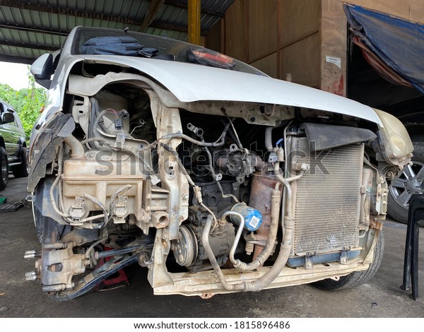Ranau, Sabah,\
Malaysia, September 16, 2020 the front of a Perodua Viva brand car\
that is being ripped\
off.