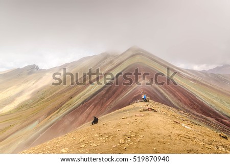 Similar – Woman on the top of the Rainbow Mountain, Peru.