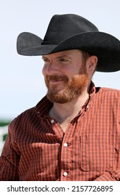 Ranch Cowboy Portrait Smiling With Red Beard 