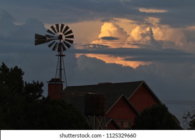Ranch house, windmill and summer storms