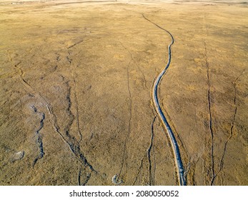 ranch road and cattle trails - aerial view of Pawnee National Grassland in northern Colorado - Shutterstock ID 2080050052
