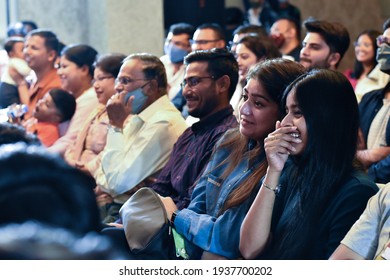 Ranchi, Jharkhand, India - 14 January 2021: Group of diverse Indian happy smiling audience listening to the speaker and enjoying the show.