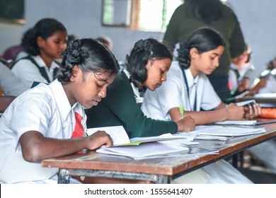 Ranchi,Jharkhand / India - November 5 2019: Group Of Indian Government School Girls Students In Uniform Studying Hard From Books In The Classroom Of Their School. Inside Class Room. Kanya Vidyalaya.