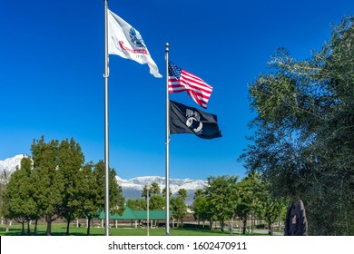 Rancho Cucamonga, CA / USA – December 28, 2019: The Flags Of The United States, POW MIA, And USA Army In Central Park Located In Rancho Cucamonga, California.