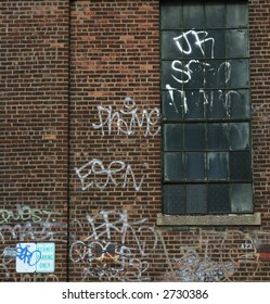 Random Graffiti On A New York City Brick Wall