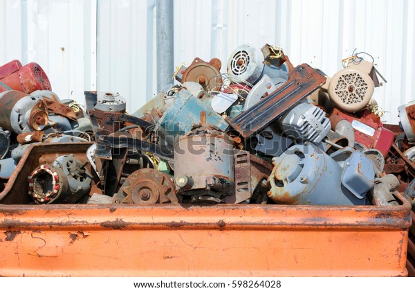 Random\
junk and scrap metal at a metal recycling\
center.