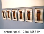 A range of automatic fuses are in the on position