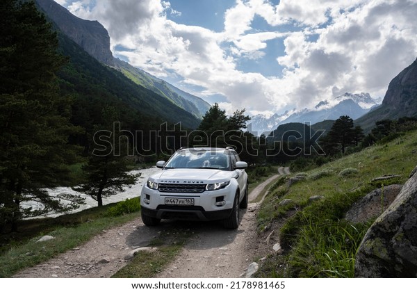 Range Rover
Evoque car on the background of the mountains of the North Caucasus
in Russia. Sunny day on June 6,
2022