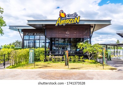 Ranong, Thailand - Feb 11, 2020 : Cafe Amazon coffee shop with nature environment against blue sky and clouds background. Cafe Amazon is a famous Thai franchise coffee house in Thailand