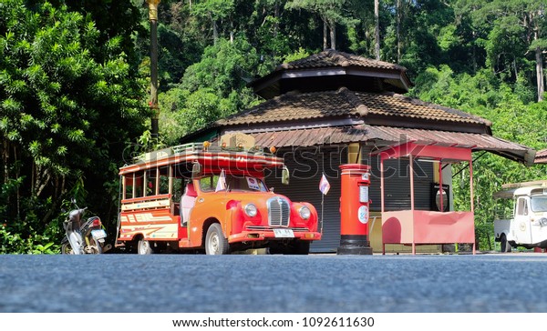 RANONG,THAILAND-CIRCA APRIL,2018.Bus\
made of wood The symbol of Ranong Tourism of the West of\
Thailand