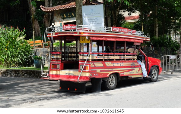 RANONG,THAILAND-CIRCA APRIL,2018.Bus\
made of wood The symbol of Ranong Tourism of the West of\
Thailand