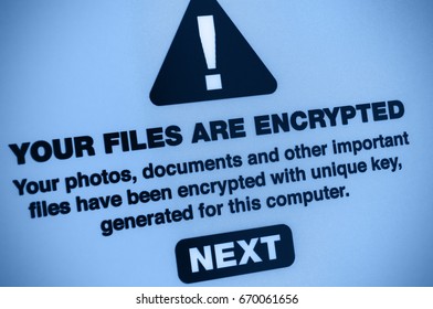 Ransomware - Close up of Your Files Are Encrypted Sign on the Screen - Shallow Depth Of Field