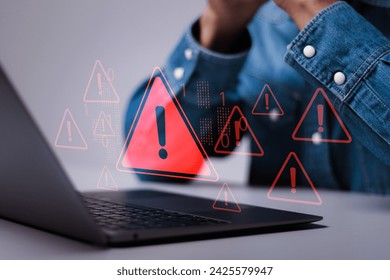 Ransomware malware attack and data breach. Spam virus with warning caution for notification on internet security protect. Person use laptop system hacked warning sign on virtual screen. - Powered by Shutterstock