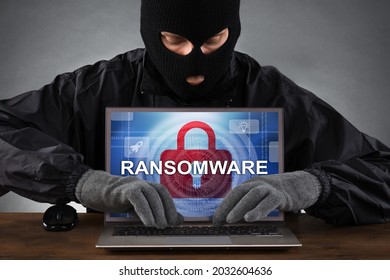 Ransomware Virus. Ransom Extortion Attack. Hacked Encrypted Laptop