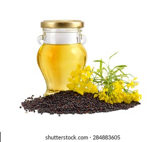 Rapeseed Oil With Seeds And Flowers. Isolated.