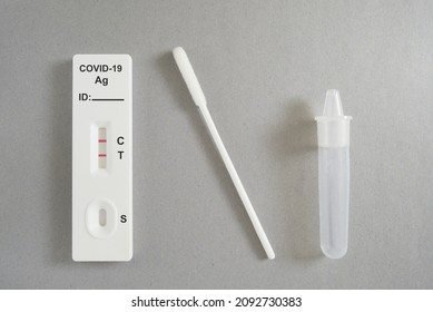 Rapid Antigen Test Kit With Positive Result During Swab COVID 19 Testing. Covid 19 Alpha, Beta, Gamma, Delta, Lambda, Mu, Omicron, Deltacron, Flurona Variants Outbreak Around The World.