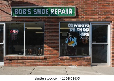 Rapid City, South Dakota - May 26, 2020: The Vintage Storefront For Bob's Shoe Repair, In The Downtown Area.