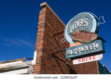 Rapid City, South Dakota - May 26, 2020: A Vintage Neon Sign For Bob's Shoe Repair, In The Downtown Area.