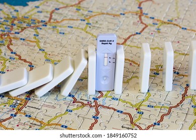 Rapid Test Stops Fall Of Dominoes Represents Infected People. COVID-19 Virus Pandemic. Stop Spread Coronavirus Exponential Growth Epidemic. Tough Measures, Control Situation. ¨Map Background. 