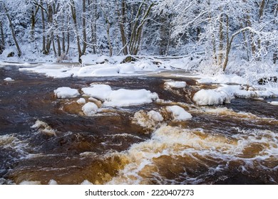 Rapid Water In A River With Ice