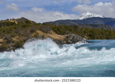 Rapids at the confluence of the turquoise Rio Baker and the glacier grey Rio Nef, between Puerto Guadal and Cochrane, Región de Aysén, Chile, South America - Powered by Shutterstock