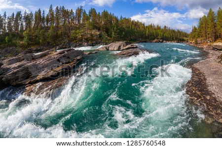 Rapids on the Sjoa river in Oppland County of Eastern Norway, Scandinavia, popular for rafting, kayaking, riverboarding and other activities