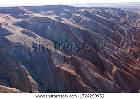 The Raplee Anticline in aerial over Utah desert
