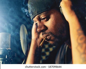 Rapper With Joint In Recording Booth