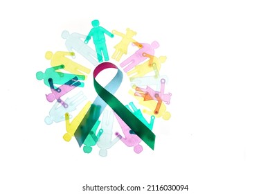 Rare Disease Day Background. Colorful awareness ribbon with group of people with rare diseases. - Shutterstock ID 2116030094
