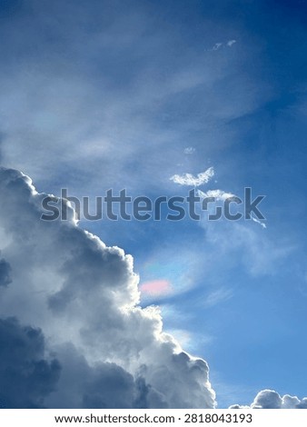 The rare occurrence of a fire rainbow in the sky