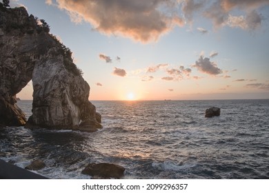 The Rare Rock And Setting Sun