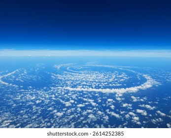 Rare Spiral Cloud Patterns Over the Ocean Seen from Above