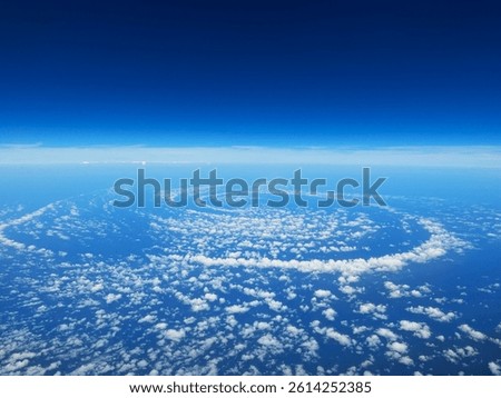 Rare Spiral Cloud Patterns Over the Ocean Seen from Above