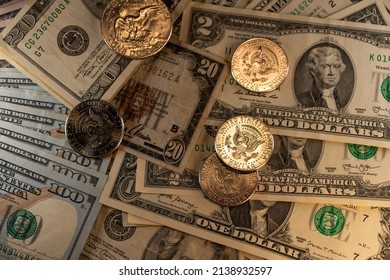 Rare US Dollar Banknotes And Coins. USD Currency. Historic Banknotes And Coins. Half Dollar Coins Shining On Paper Money