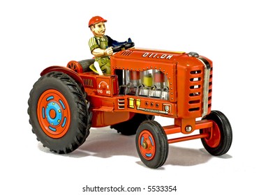 Rare Vintage Red Tractor Toy Isolated On White Rare Vintage Red Tractor Toy Isolated On White
