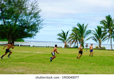 Rarotonga Cook Islands - November 3 2010; Group Of Young Maori Males Playing Rugby For Fun.