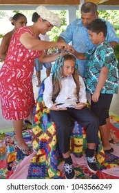 RAROTONGA - DEC 29 2017:Haircutting Ceremony In Cook Islands Began When Missionaries Arrived But In Pre-Christian World Maori Belief That Growing A Boys Hair Long Ensured He Survived Beyond Infancy.