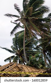 RAROTONGA - SEP 16:Damaged building during tropical storm on Sep 16 2013.Since 1998, the Cook Islands has experienced more intense storms, flooding and wave surges, damaging coastal infrastructure.