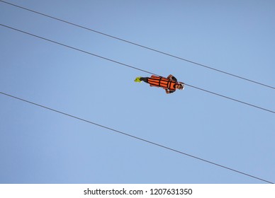 Ras Al Khaimah, UAE,  13th October, 2018: Person Sliding Down Jebel Jais Mountain Via World's Longest Zip Line.