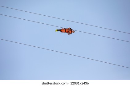 Ras Al Khaimah, UAE,  13th October, 2018: Person Sliding Down Jebel Jais Mountain Via World's Longest Zip Line.